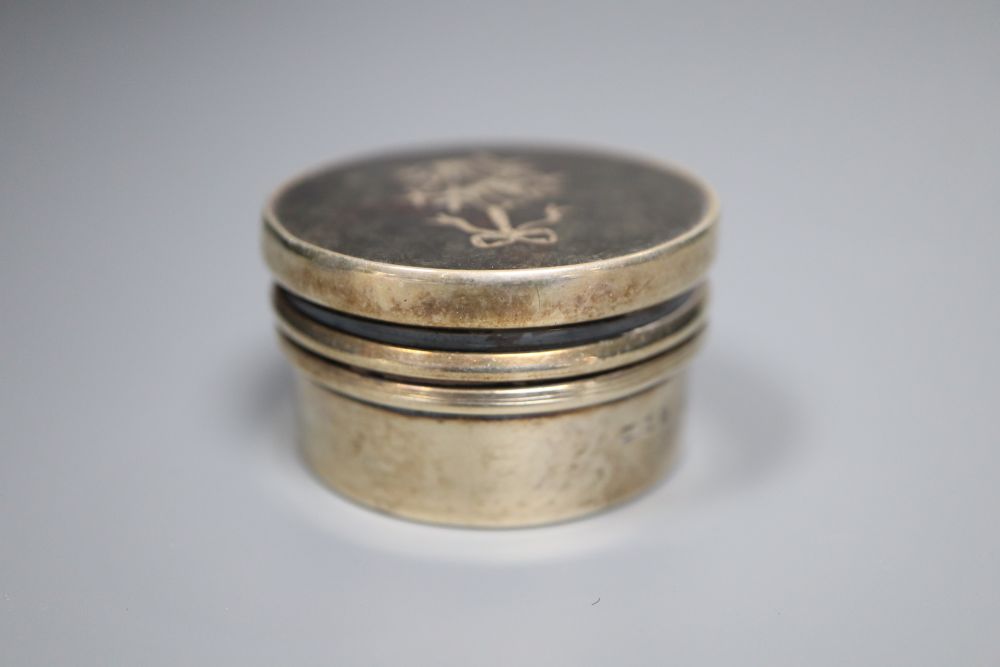 Three various tortoiseshell and silver pique-mounted glass toilet jars and a small silver circular box